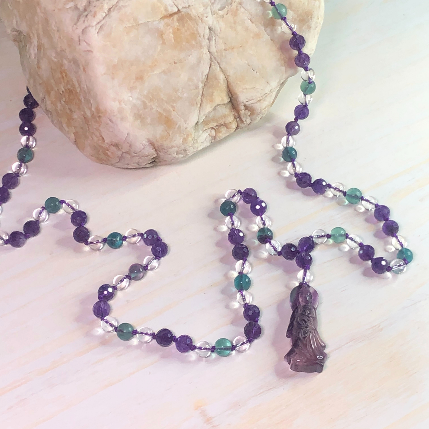 Amethyst, Rainbow Fluorite, and Clear Quartz Mala with Quan Yin Charm