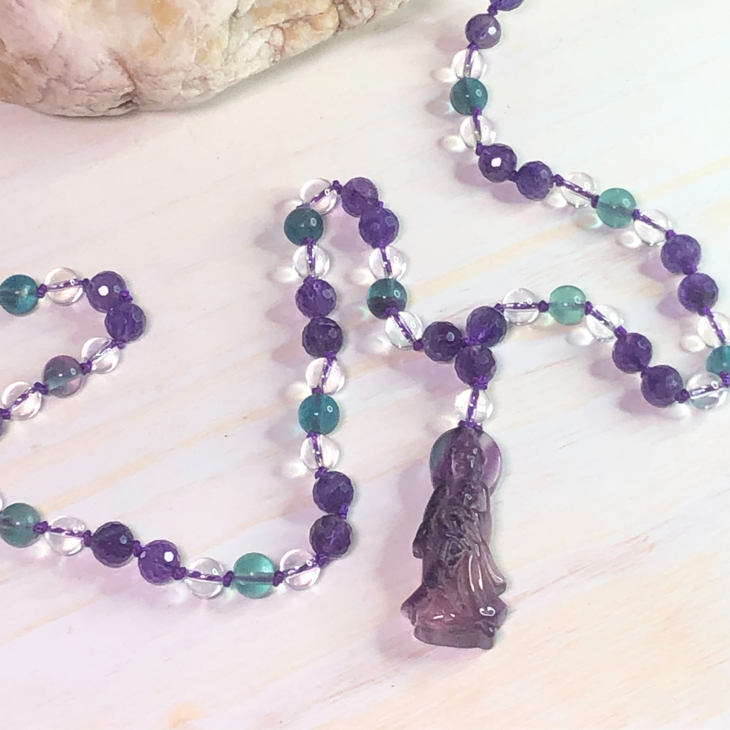 Amethyst, Rainbow Fluorite, and Clear Quartz Mala with Quan Yin Charm